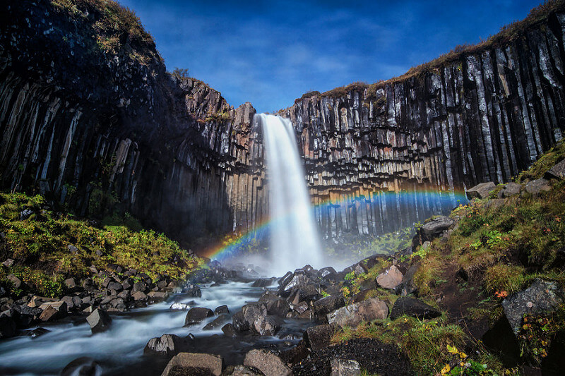 long exposure waterfall rainbow