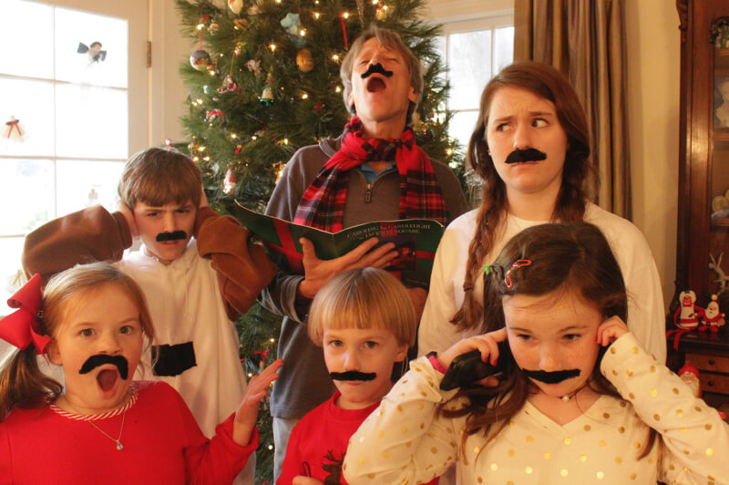 Elliott Cowand - Christmas caroling family