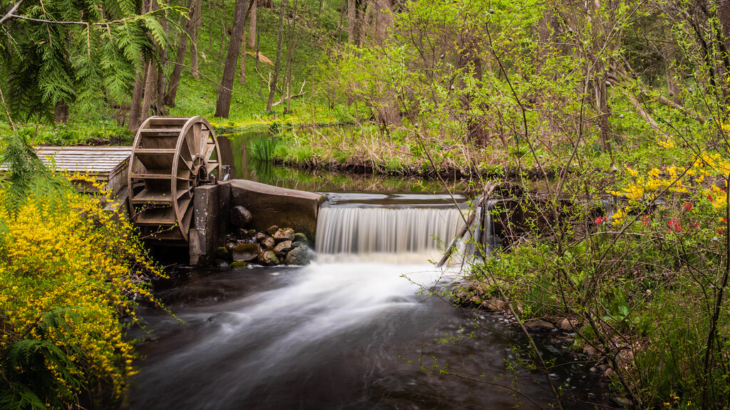 long exposure photography of watermill