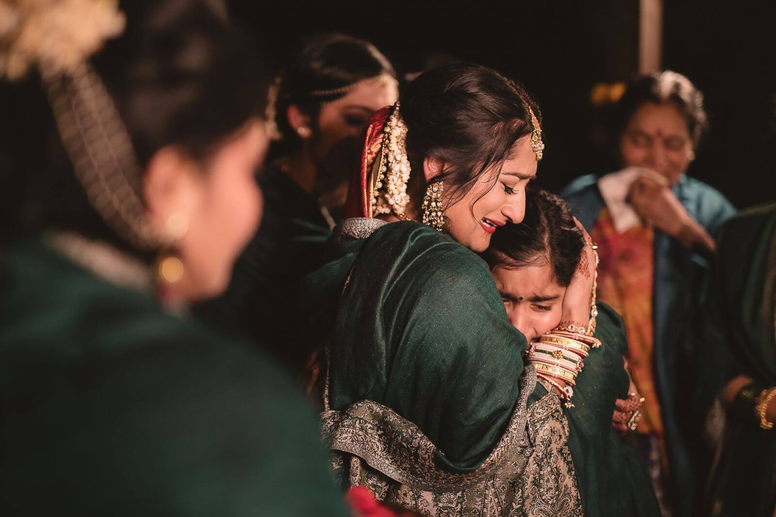 family says goodbye during vidaai with candid photography