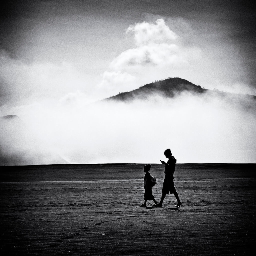 Shirren Lim - 2 boys walking on the plains of Mt Bromo
