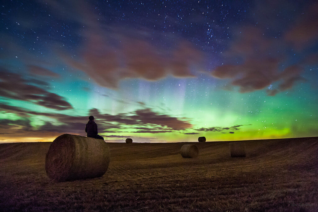 Tyler Gerritsen - northern lights with hay bales