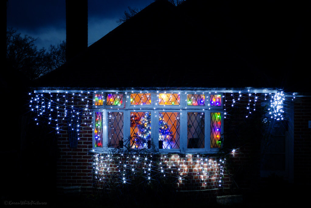 Karen White - a house with Christmas lights