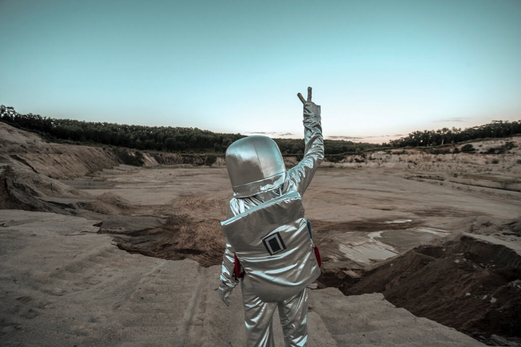 Spaceman making peace sign